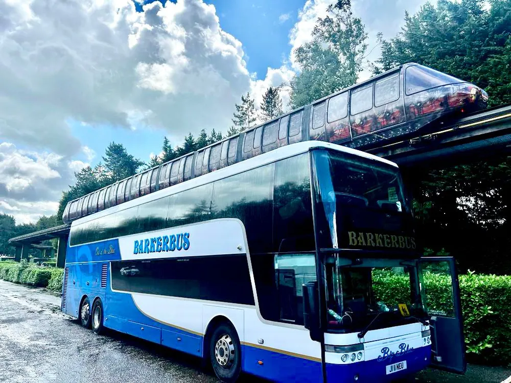 Barker Bus Van Hool double decker with the door open