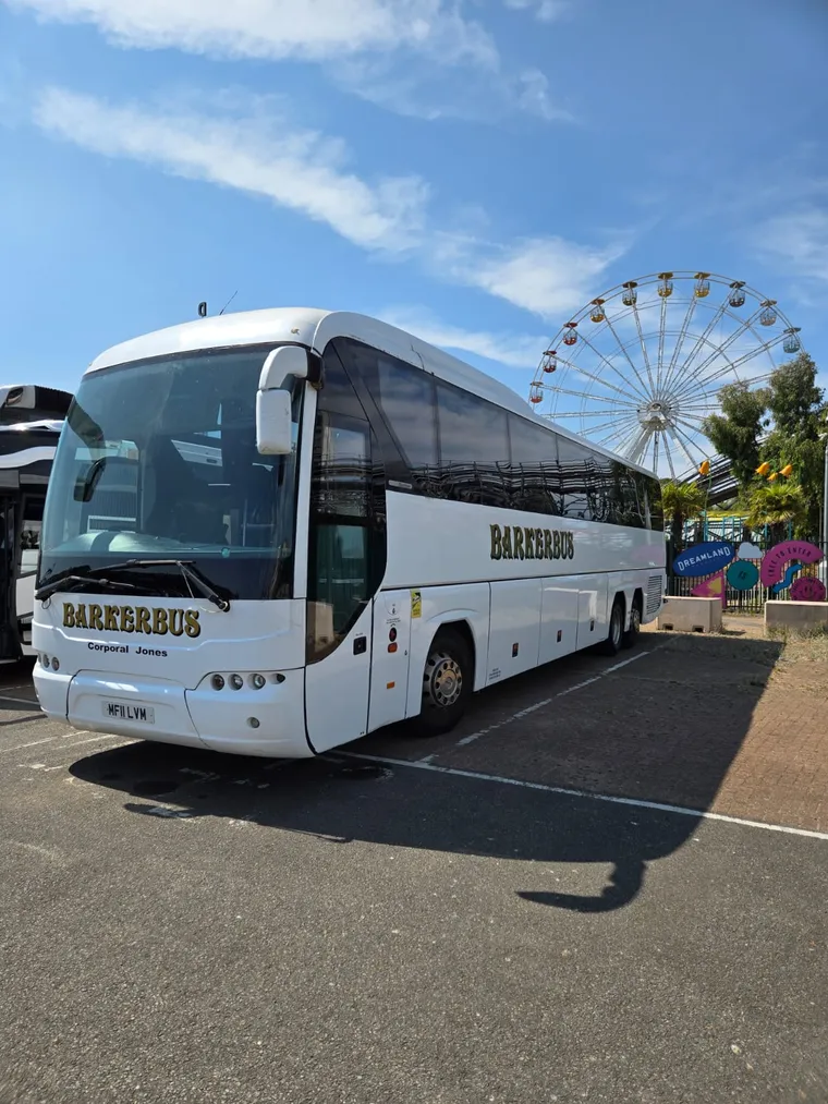 A Barker Bus coach on school and college work